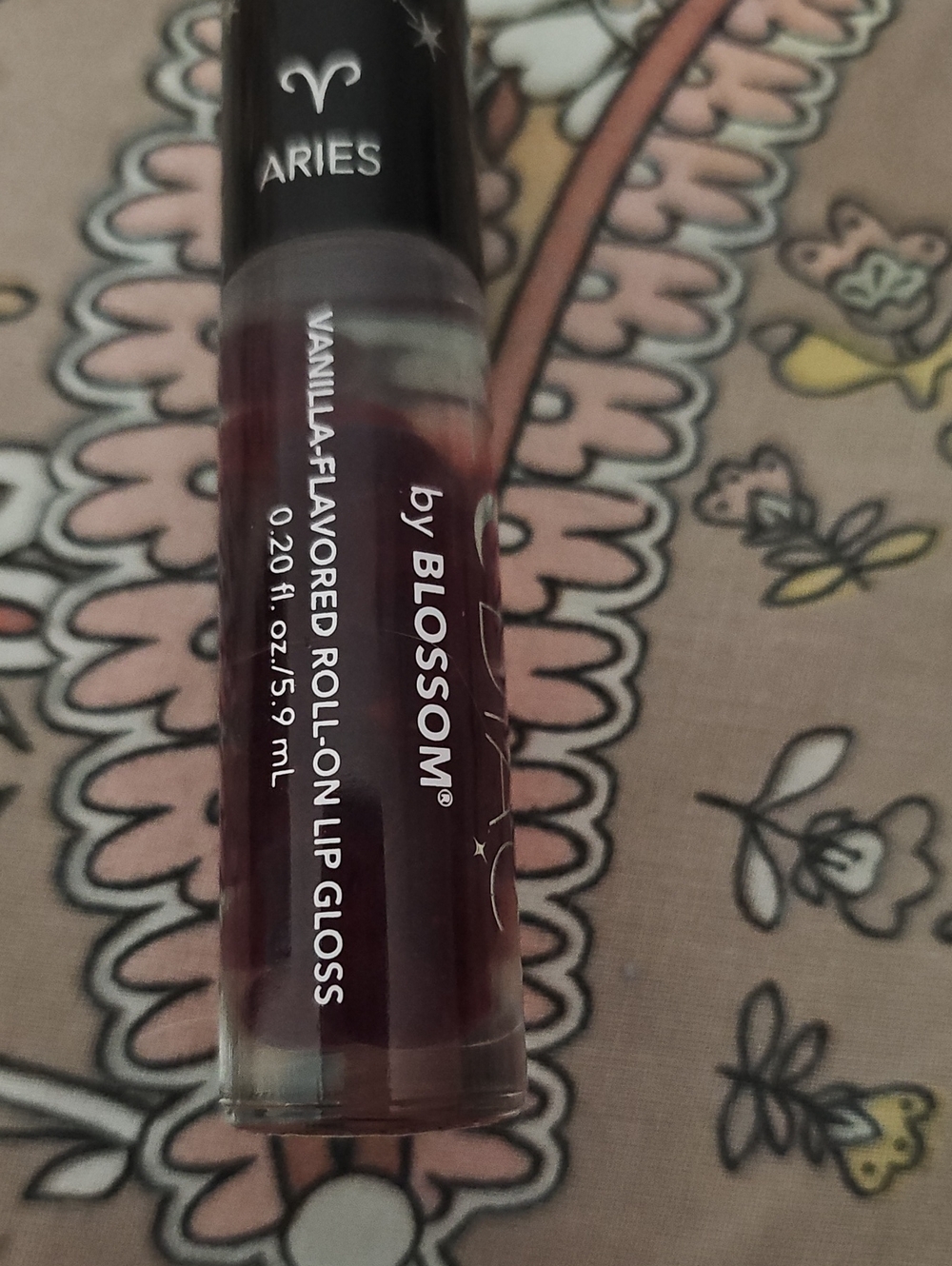 Aries Vanilla-Flavored Roll-On Lip Gloss — Deep Berry Pink
